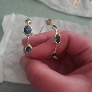18k yellow gold hoop earrings with blue topaz ston